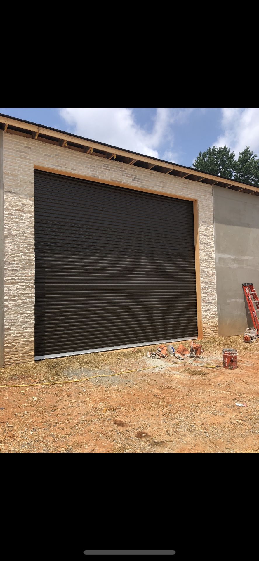 LOW PRICE NEW GARAGE DOOR