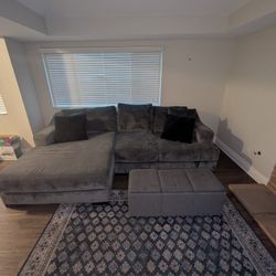 12' Sectional with Oversized Chaise, Ottoman, And Pillows