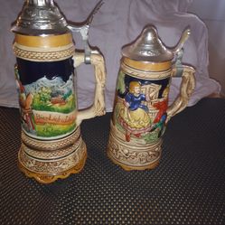Two German Beer Steins Music Boxes Selling As A Set Working Condition. All Sales Final.