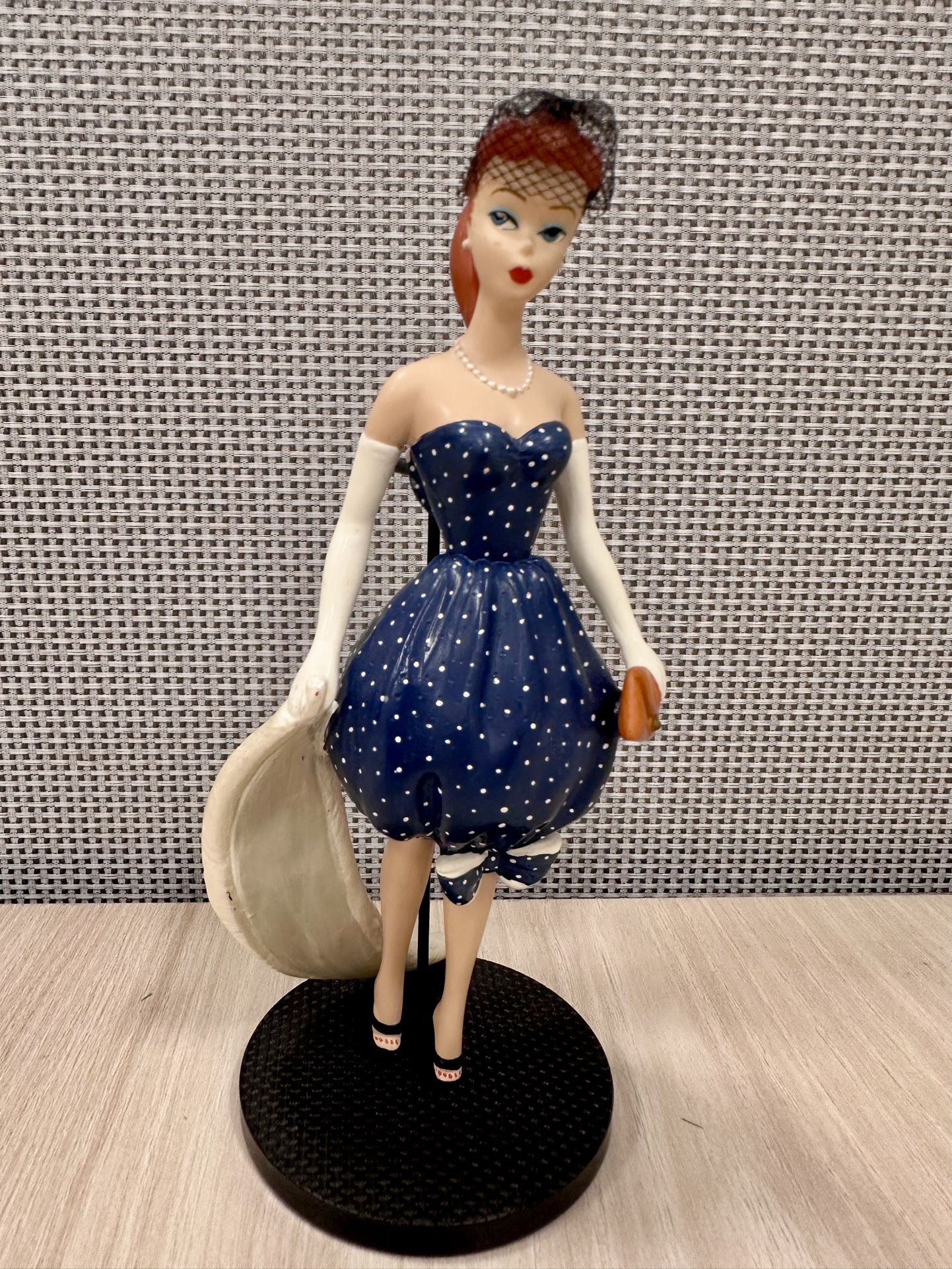 Barbie figurine wearing Gay Parisienne
