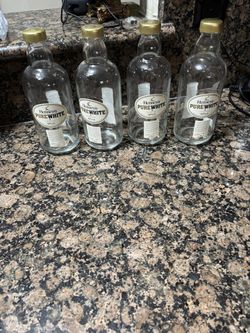 Empty Pure white Hennessy Bottles