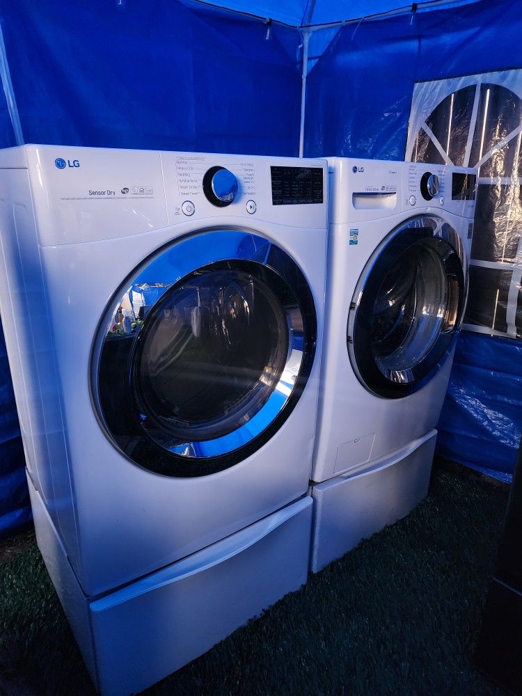 White L.G. Washer And Dryer Set With Pedestals
