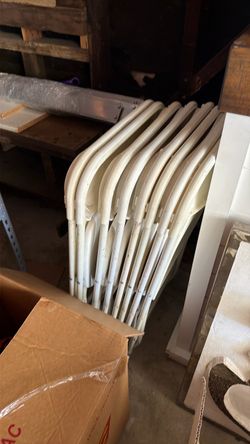 8 White Folding Chairs