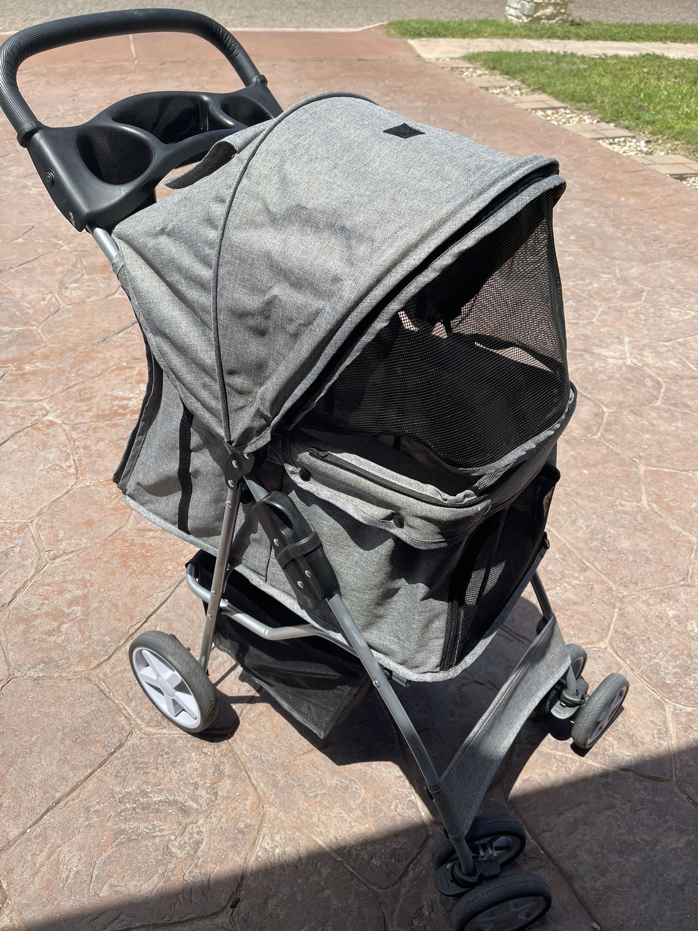 Dog Stroller In Almost New Condition.