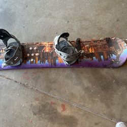 K2 Snowboard And Woman’s 8.5 White Boots In Good Use