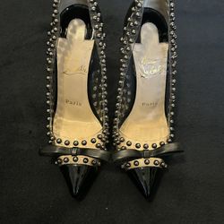studded louboutin red bottom heel 
