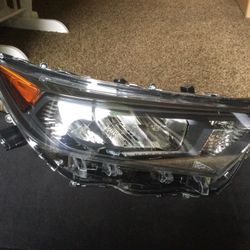  NEW Toyota RAV4 TYC Headlight Passenger Side