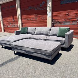Living Spaces Gray Sectional Sofa Chaise With Ottoman