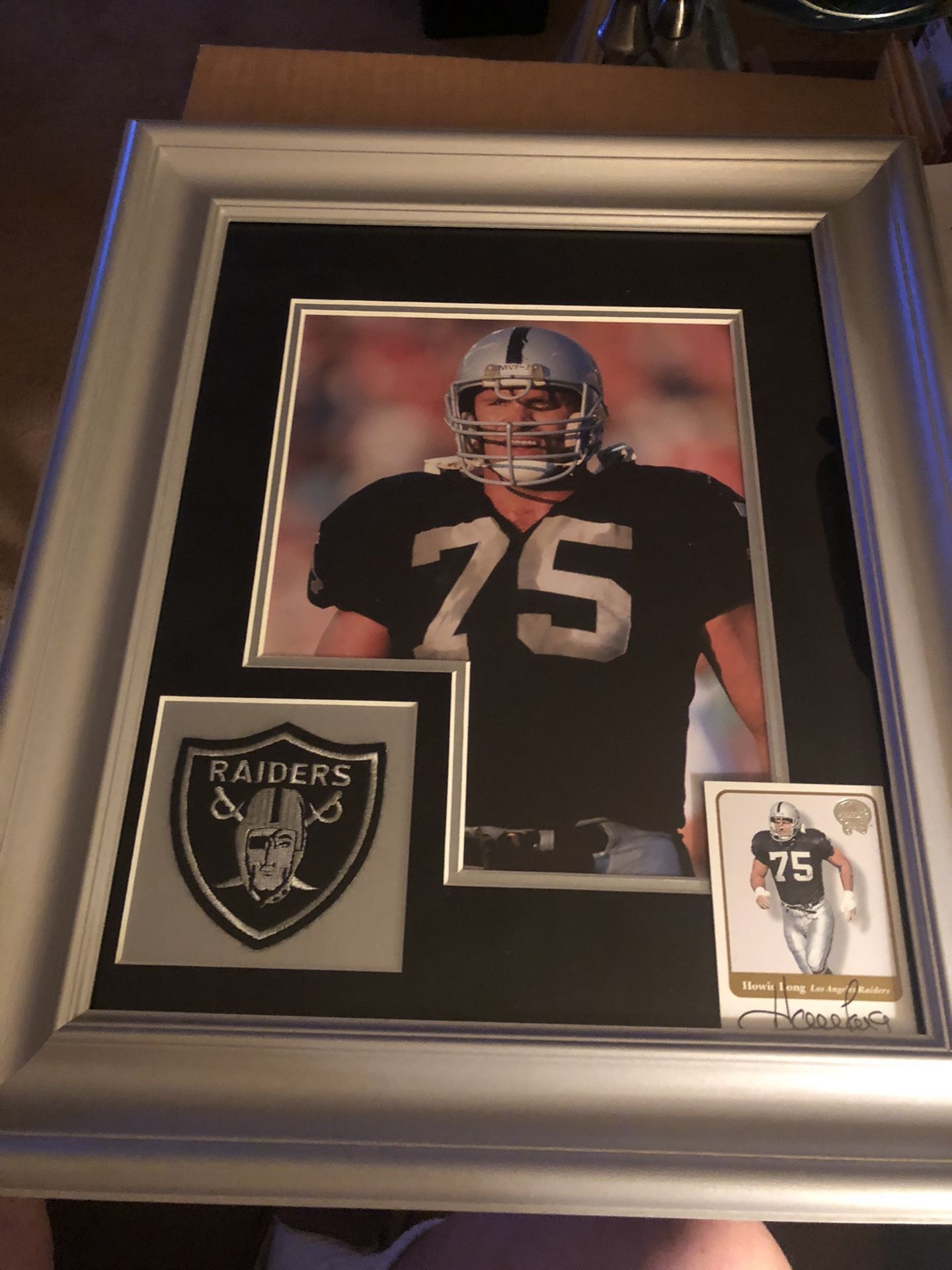 Howie Long-Oakland Raider Super Bowl Autographed Fleer Greats of the Game” Card framed with 8x10 Photo and Raiders Embroidered Patch/Logo framed one
