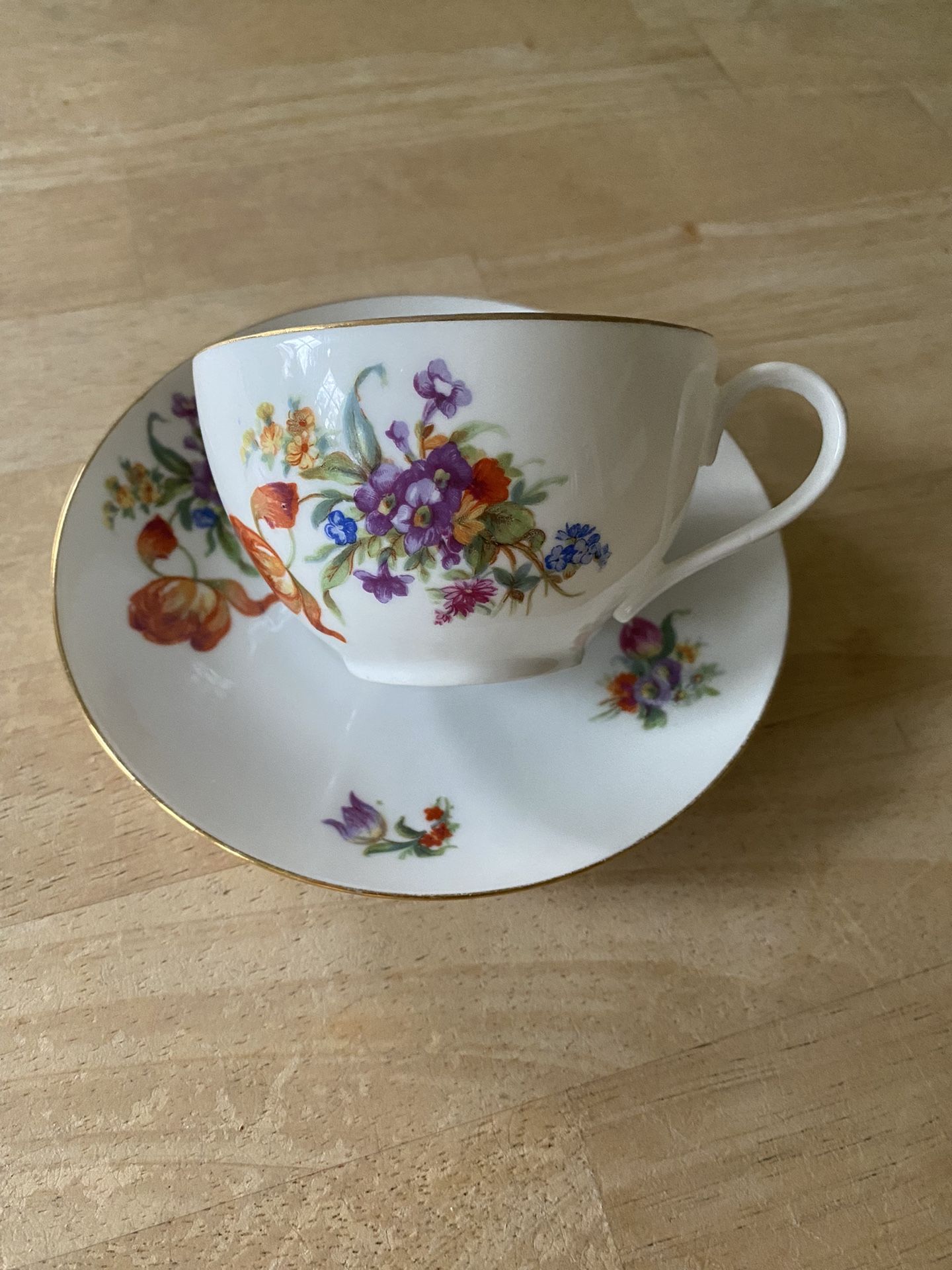 Vintage Union K floral tea cup and saucer, made in Czechoslovakia. Gold rimmed porcelain set.