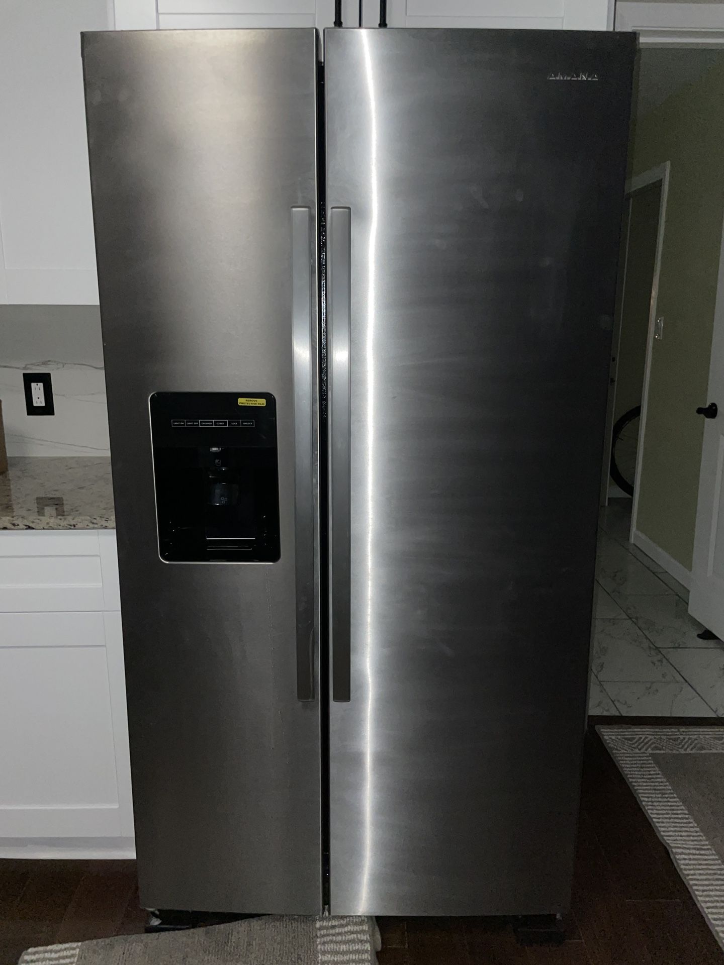 Amana Fridge, Electric Stove, and Dishwasher