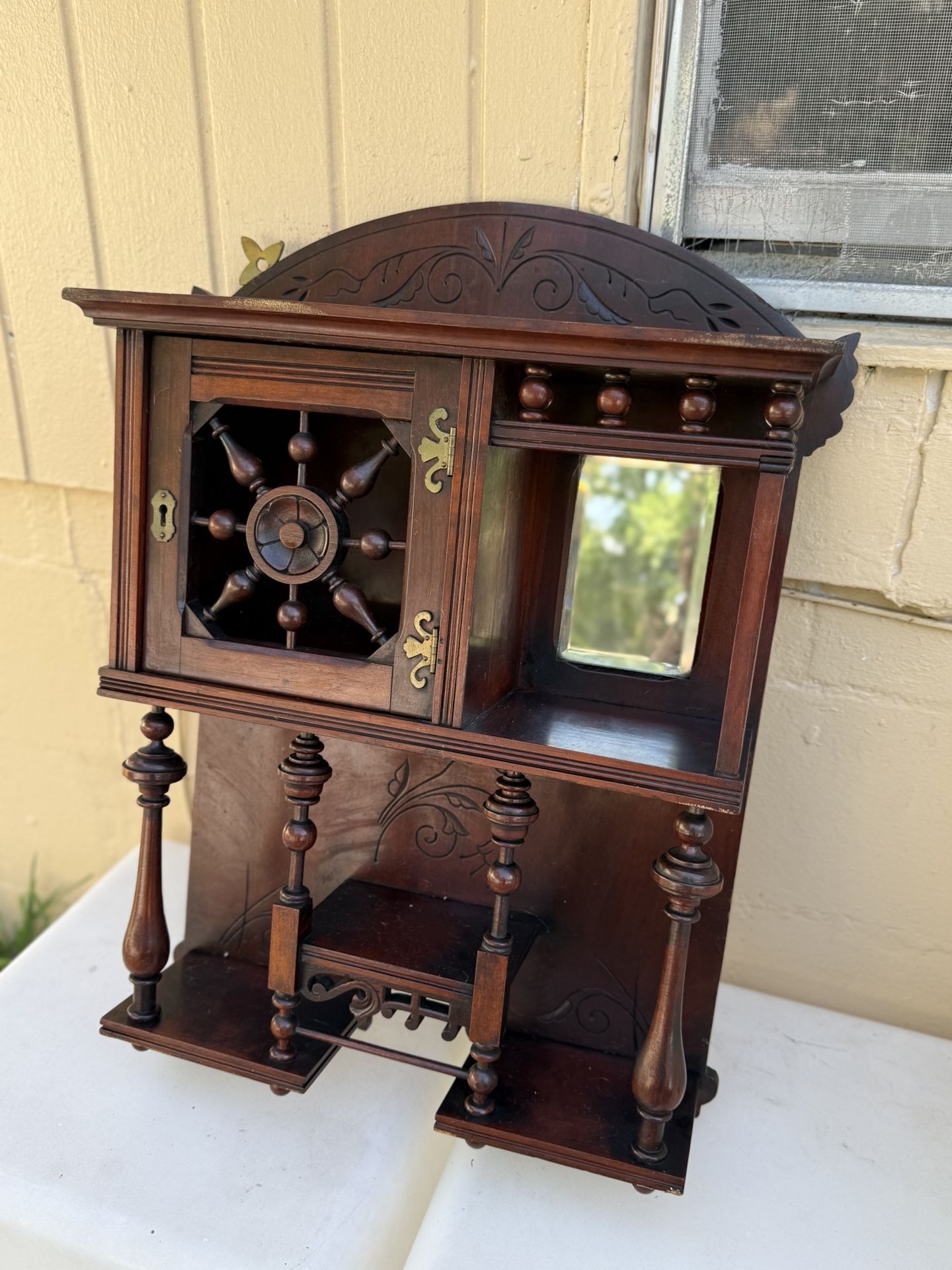 Rare vintage carved wood curio cabinet with Nautical themed with mirror
