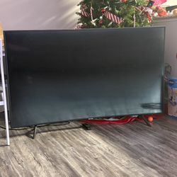 Tv, Sound Bar And Tv Stand