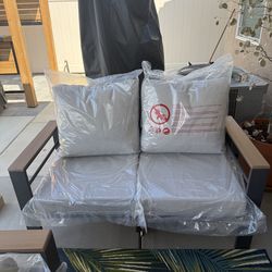 Patio love seat brand new