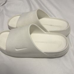 White Nike slides