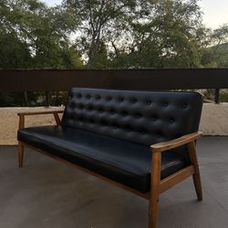 Mid Century Style Baxton Studio Black Faux Leather & Wood Couch 