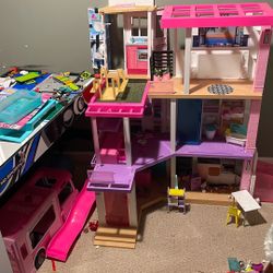 Barbie Dream House, Barbies, and accessories 
