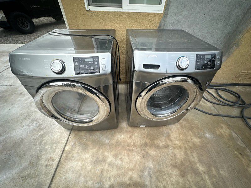 SAMSUNG GREY SELF CLEAN FRONT LOAD STEAM WASHER AND GAS DRYER SET 