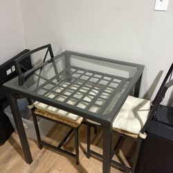 Glass top Metal Table + 2 Chairs + 2 Cushions