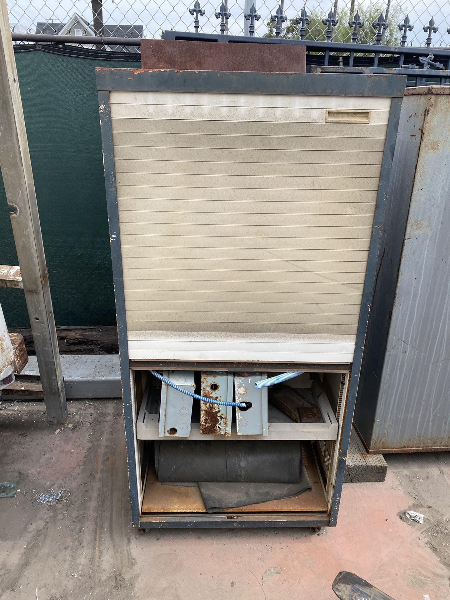 Storage cabinet with roll up door and file cabinet with one drawer that is a safe. $100 obo