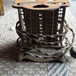 Antique Heater And Plate Holder On Top