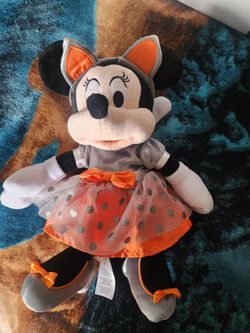 Disney Parks Halloween Minnie Mouse plush toy.