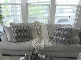 Large Beige Fabric Sofa with Accent Pillows