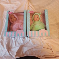 Two  baby dolls boy and girl