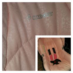 Pink/peach baby seat. Leopard print.