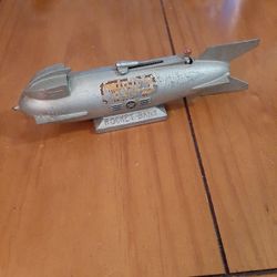 Is super rare 1950s cast iron asked iron space rocket mechanical mechanical bank works
