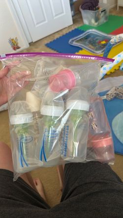 Assorted baby bottles
