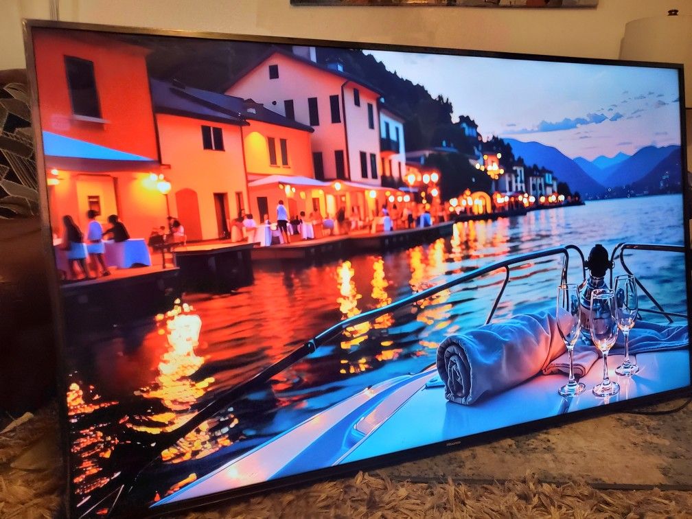 70'" hisiense Google Android smart tv 4k great condition comes with wall mount set. Tv has great qu
