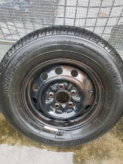 Toyota 14" Rim, Tire and Hubcap