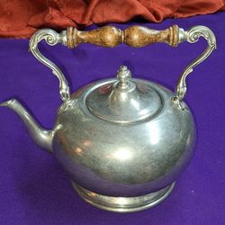 Vintage 1969 Stockholm Pewter teapot, notable for its elegant design and Scandinavian craftsmanship. G10L022
