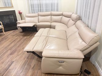 The sofa is made of genuine leather