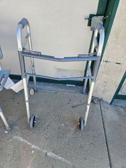 WALKER WITH WHEELS BRAND NEW WITH TAGS