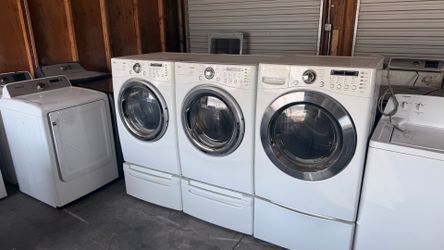 3 identical  LG gas dryers  with pedestal