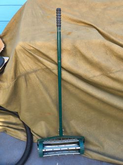 Rolling Lawn Aerator with Long Handle