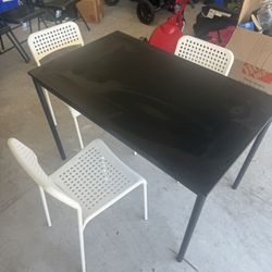 Wooden Table And 3 Plastic Chairs