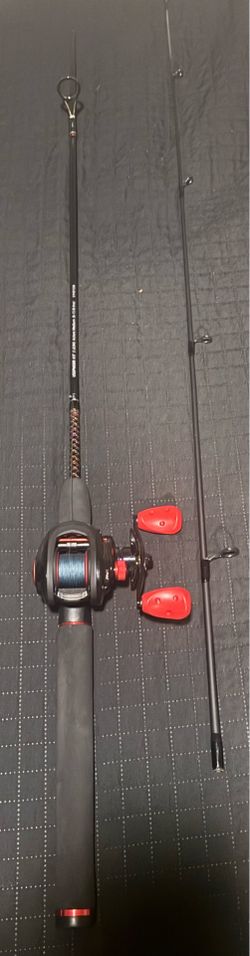 6ft6 right hand baitecaster Abu Garcia with uglystick gxt 2 piece pool. with 20lb braided moss green line