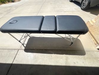 Massage table