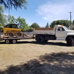Skid Steer And Dump Truck 