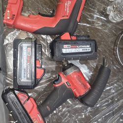 Set Milwaukee 1/4 in. Impact ,Cordless Drywall Screw Gun