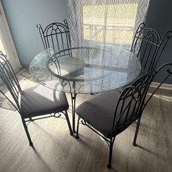 Round Glass Table With Four Chairs