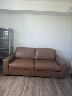 Brown rooms to go leather pullout couch