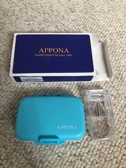 Pill organizer with pill cutter