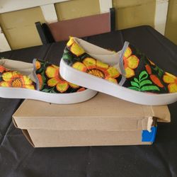 hand-embroidered slip-on espadrille shoes featuring a sunflower design