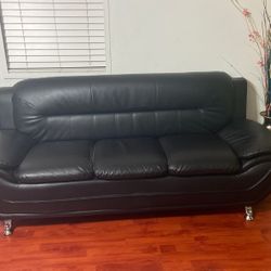 Two couches one electric chair