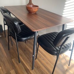 Table with leather chairs