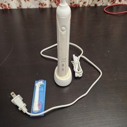 Oral B Bruan Electric Toothbrush With Charging Stand Base